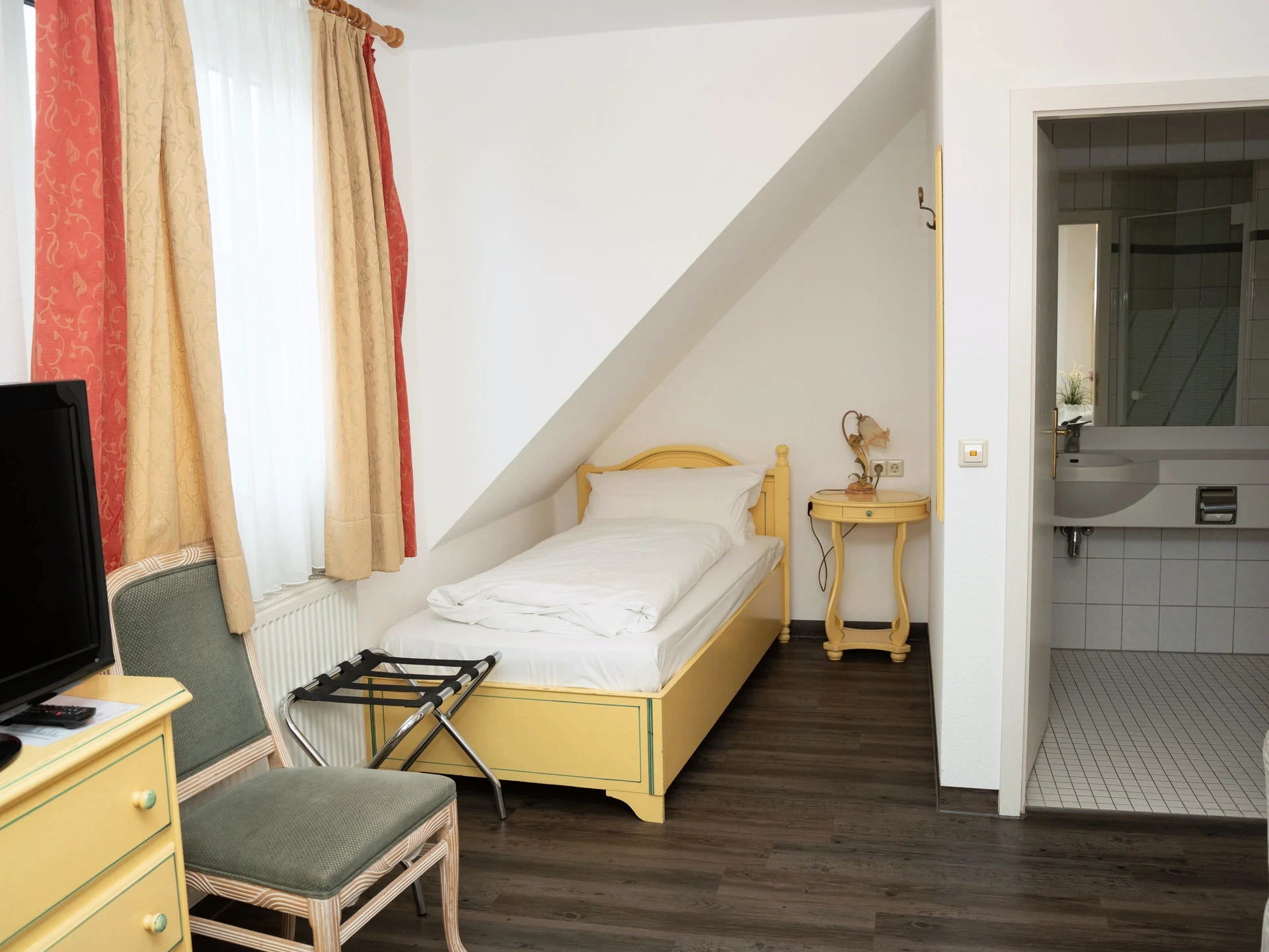 Dreibettzimmer – Einzelbett